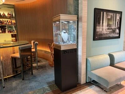 Exhibition Showcase beside a hospitality seating area