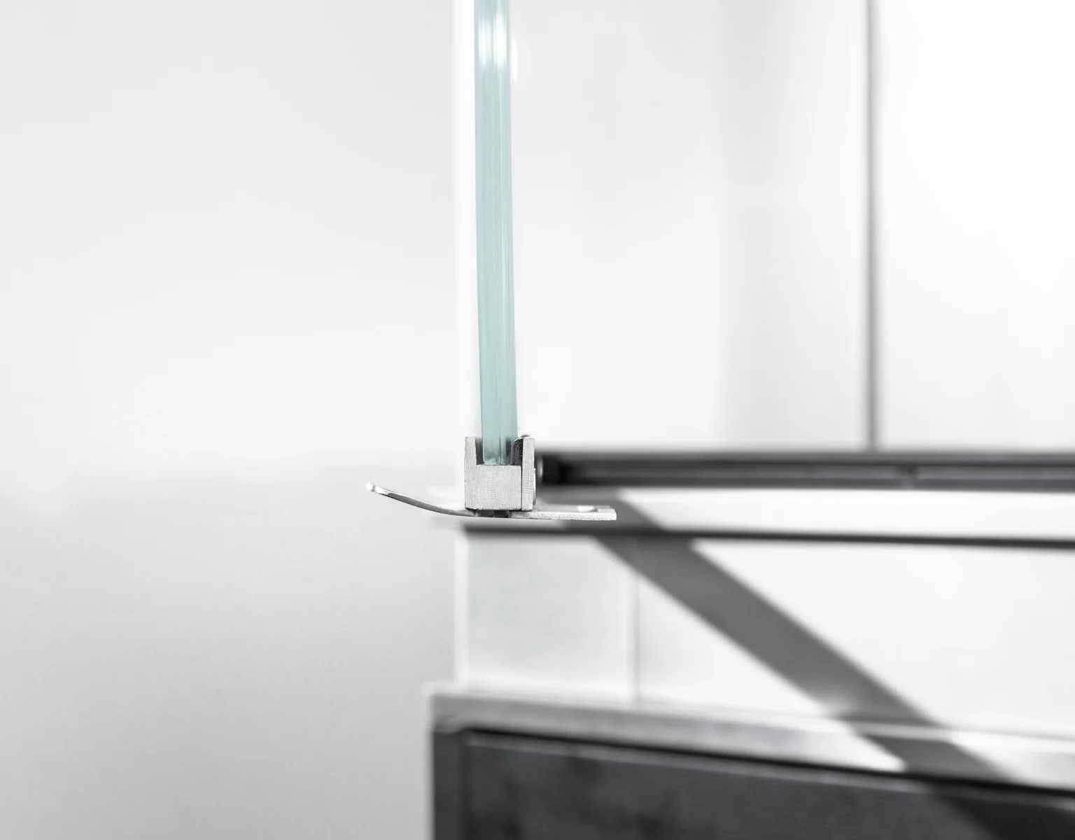 Close view of 8.8 mm showcase glass seated in its metal channel
